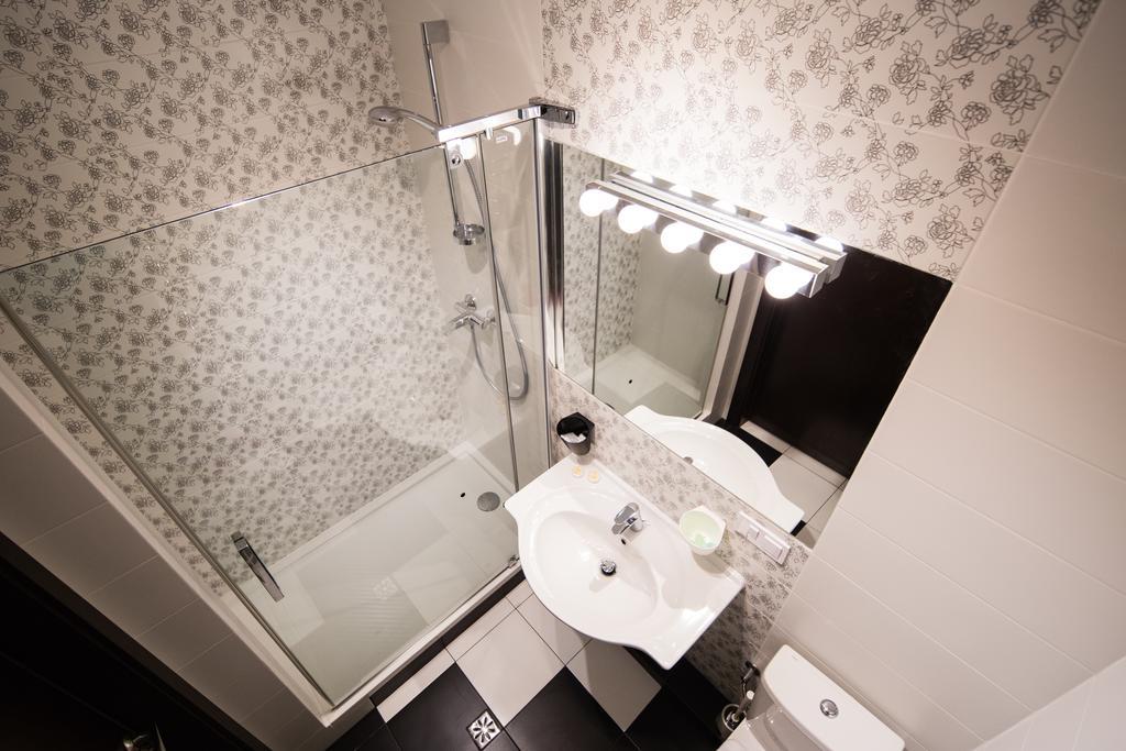Central Hotel Liov Cameră foto